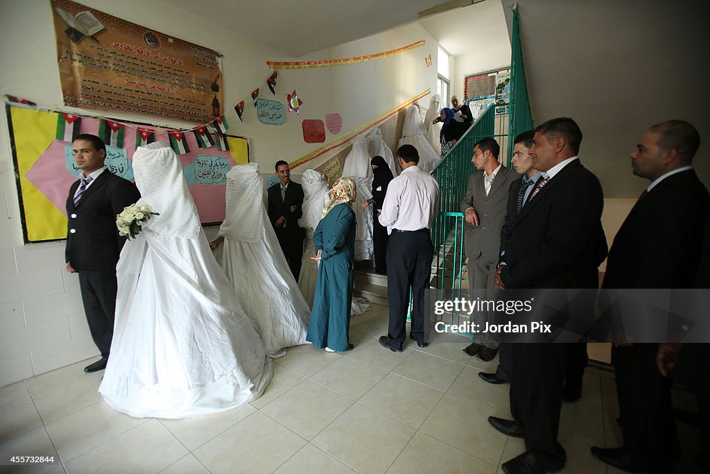 17 Couples Celebrate Their Mass Wedding in Amman