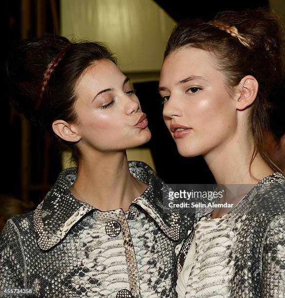 Models pose backstage ahead of Ermanno Scervino show during Milan Fashion Week Womenswear Spring/Summer 2015 on September 19, 2014 in Milan, Italy.