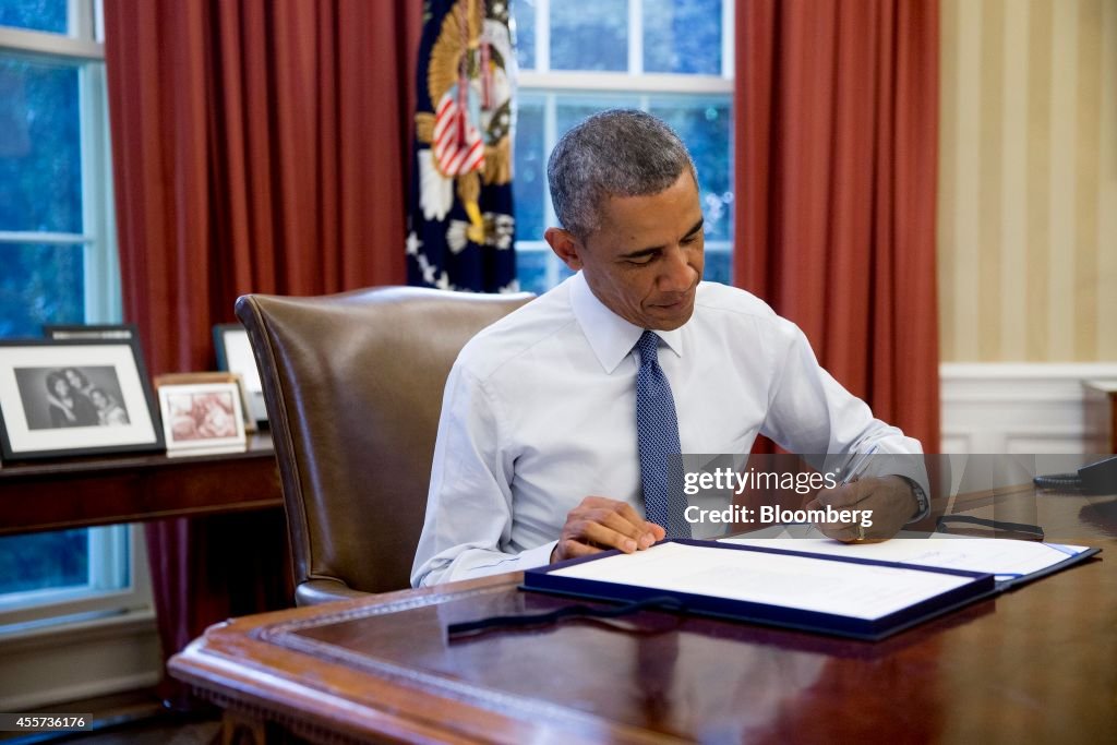 President Obama Signs H.J. Res. 124, Continuing Appropriations Resolution, 2015