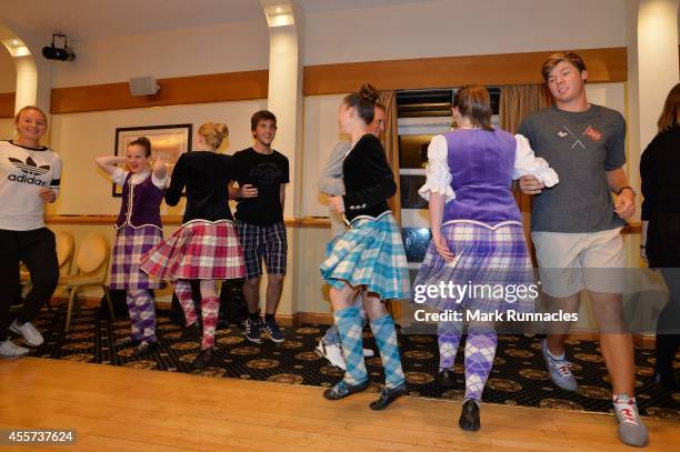 Team Europe and Team USA join together for traditional Ceilidh dancing at the Angus Hotel during the 2014 Junior Ryder Cup - Previews on September...