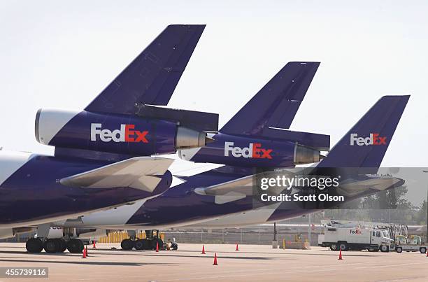 FedEx jets sit at the company's facility at O'Hare International Airport on September 19, 2014 in Chicago, Illinois. In 2013, 67 million passengers...