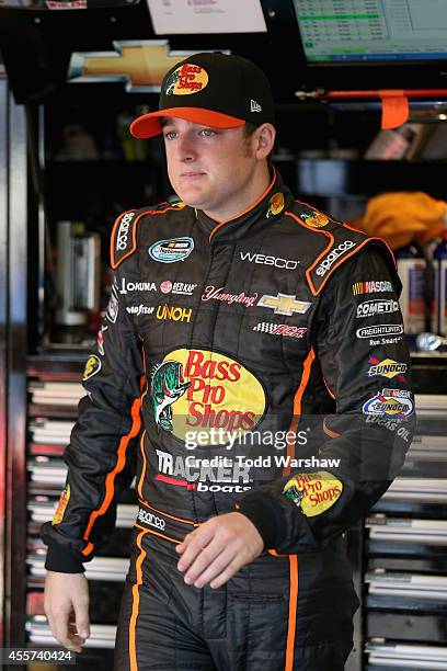 Ty Dillon, driver of the Bass Pro Shops Chevrolet, stands in the garage area during practice for the NASCAR Nationwide Series VisitMyrtleBeach.com...