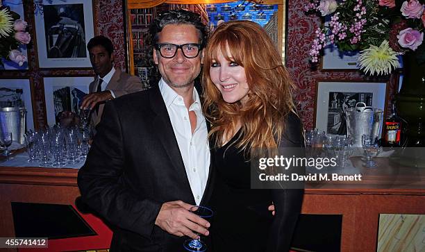 George Waud and Charlotte Tilbury attend the 35th Birthday of Harry's Bar on September 19, 2014 in London, England.