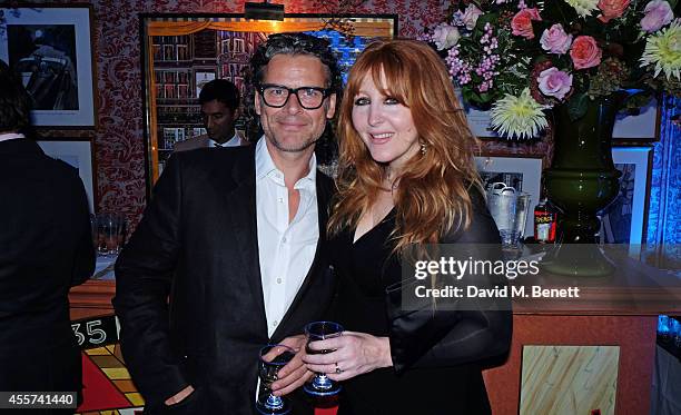 George Waud and Charlotte Tilbury attend the 35th Birthday of Harry's Bar on September 19, 2014 in London, England.