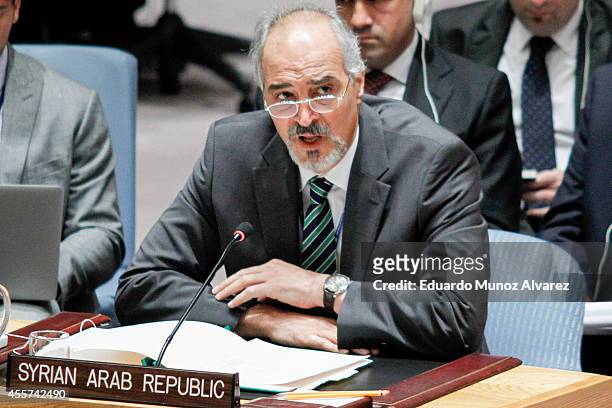 Syria's Ambassador to the United Nations Bashar Jaafari addresses to the United Nations Security Council during a meeting on the situation concerning...