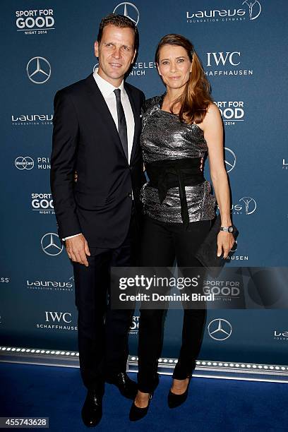 Oliver Bierhoff and Klara Szalantzy attend the Laureus Sport for Good Night 2014 at Bayerischer Hof on September 19, 2014 in Munich, Germany.