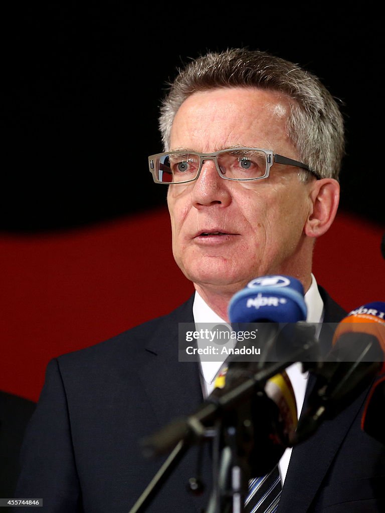 Thomas de Maiziere attends a gathering in Hannover