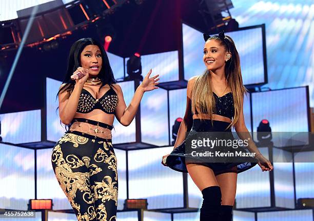 Recording artists Nicki Minaj and Ariana Grande perform onstage during the 2014 iHeartRadio Music Festival at the MGM Grand Garden Arena on September...