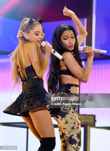 Recording artists Ariana Grande and Nicki Minaj perform onstage during the 2014 iHeartRadio Music Festival at the MGM Grand Garden Arena on September...