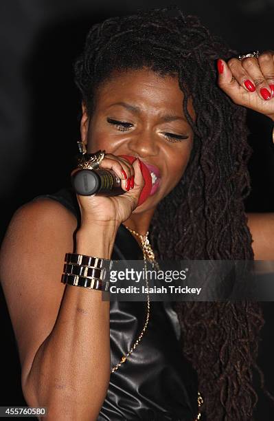 Singer Tash Lorayne performs at The Single Launch & Celebration for hit reggae artist AMMOYE at Remix Lounge on September 19, 2014 in Toronto, Canada.