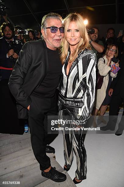 Roberto Cavalli and Heidi Klum attend the Roberto Cavalli - Show as part of Milan Fashion Week Womenswear Spring/Summer 2015 on September 20, 2014 in...