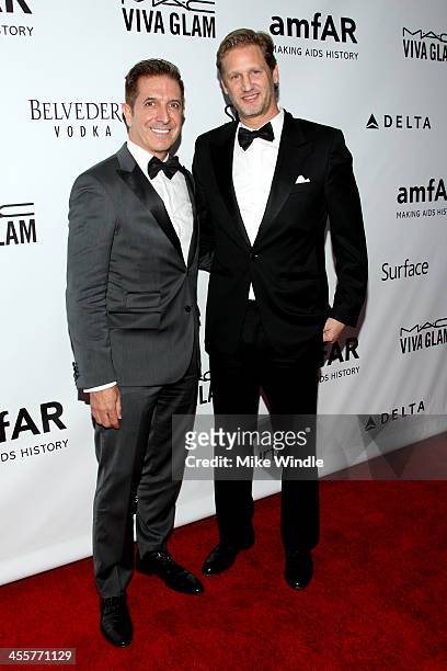 Chairman and CEO, Americas at Hugo Boss Mark Brashear and Vice President of Marketing and PR at Hugo Boss Ward Simmons attend the 2013 amfAR...