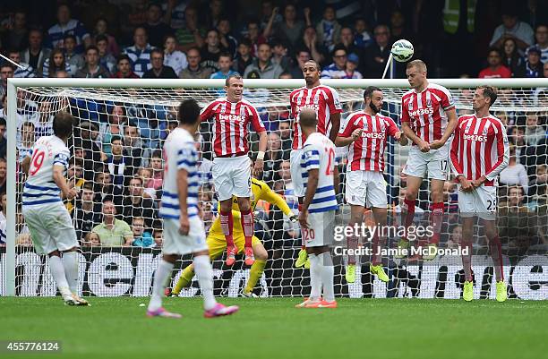 Niko Kranjcar of QPR scores from a free kick during the Barclays Premier League match between Queens Park Rangers and Stoke City at Loftus Road on...