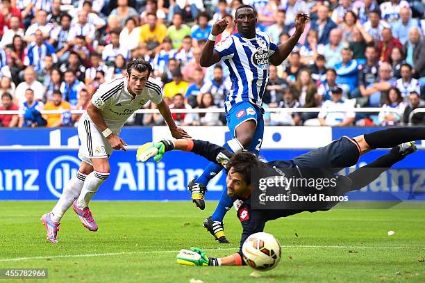 Gareth Bale of Real Madrid CF scores his team's fourth goal during the La Liga match between RC Deportivo La Coruna and Real Madrid CF at Riazor...