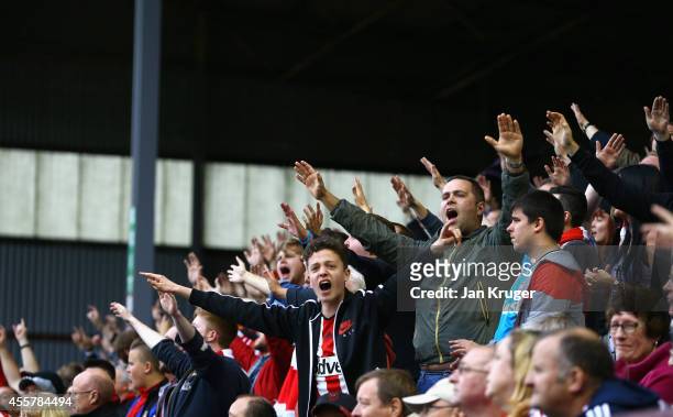 Sunderland fans show their support during the Barclays Premier League match between Burnley and Sunderland at Turf Moor on September 20, 2014 in...