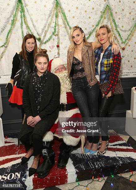 Katherine Power, Renata Faiman, Katie Nehra and Ali Taekman attend the SIMONE & SATINE Holiday Party at Satine on December 12, 2013 in Los Angeles,...