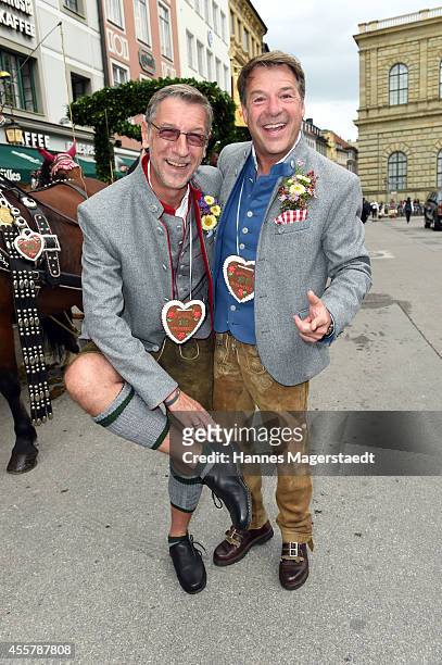Patrick Lindner and boyfriend Peter Schaefer attend the 'Fruehstueck bei Tiffany' at Tiffany Store before the Oktoberfest 2014 starts on September...
