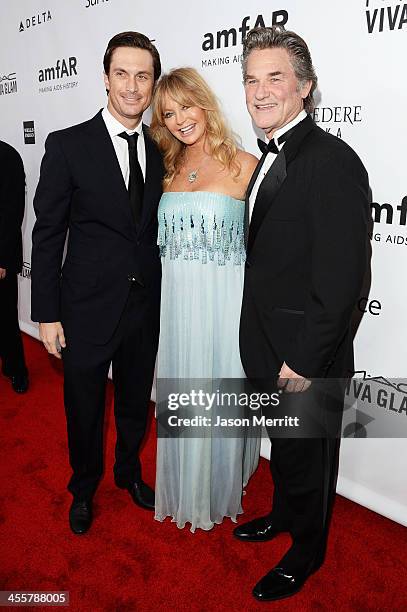 Actors Oliver Hudson, Goldie Hawn and Kurt Russell attend the 2013 amfAR Inspiration Gala Los Angeles presented by MAC Viva Glam at Milk Studios on...