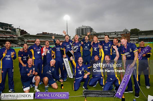 The Durham team celebrate with the trophy after they won the Royal London One-Day Cup Final between Warwickshire and Durham at Lord's Cricket Ground...