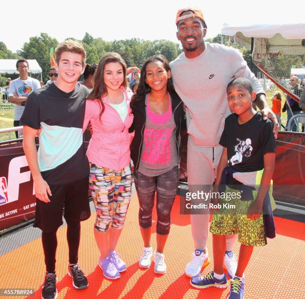 New York Knicks J.R. Smith poses with actors Jack Griffo, Kira Kosarin, Sydney Park and Tylen Jacob Williams during Nickelodeon's 11th Annual...