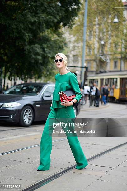 Fashion blogger Sofie Valkiers wears Marni total look, Louis Vuitton jewels and Hyde's sunglasses on September 20, 2014 in Milan, Italy.