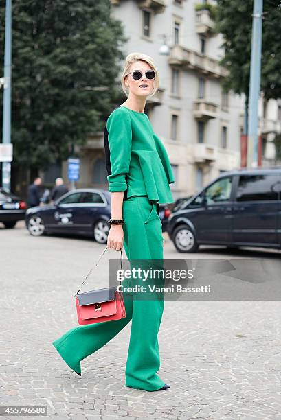 Fashion blogger Sofie Valkiers wears Marni total look, Louis Vuitton jewels and Hyde's sunglasses on September 20, 2014 in Milan, Italy.