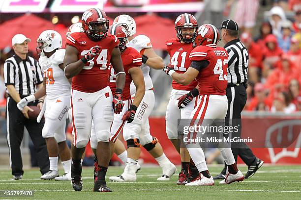 Jesse Hayes of the Wisconsin Badgers celebrates after getting an interception during the third quarter against the Bowling Green Falcons at Camp...