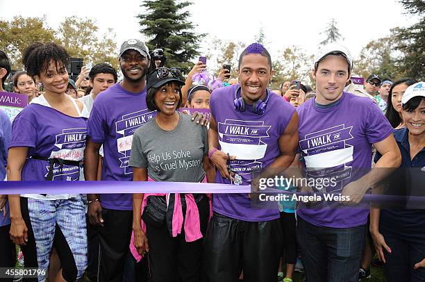 Actors Latarsha Rose, B.J. Britt, Margaret Avery, Nick Cannon, Ian Harding and NBC4 LA anchor Kathy Vara attend the Walk to End Lupus Now event at...