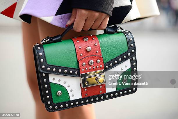 Guest poses wearing a Fausto Puglisi dress and Prada bag on September 20, 2014 in Milan, Italy.