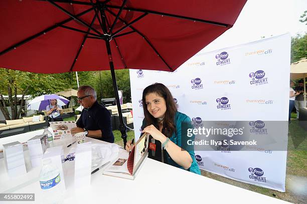 Chefs Geoffrey Zakarian and Alex Guarnaschelli sign books at Food Network in Concert on September 20, 2014 in Chicago, United States.