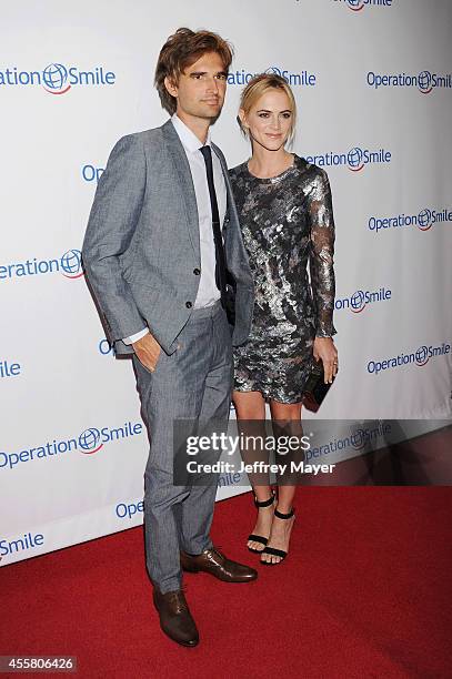 Actress Emily Wickersham and husband/musician Blake Hanley attend the 2014 Operation Smile Gala at the Beverly Wilshire Four Seasons Hotel on...