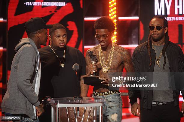 Rappers YG, DJ Mustard, Rich Homie Quan and Ty Dollar $ign appear onstage during the BET Hip Hop Awards 2014 at Boisfeuillet Jones Atlanta Civic...