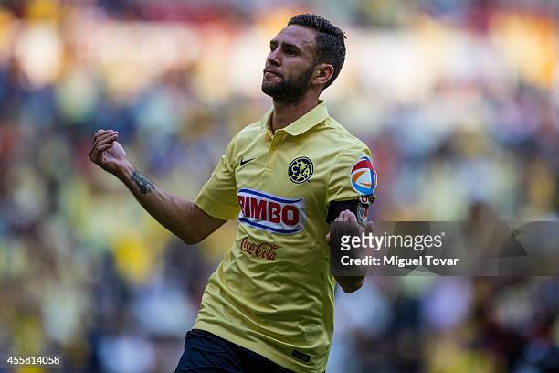 Miguel Layun of America celebrates after scoring the winning goal during a match between America and Pachuca as part of 9th round Apertura 2014 Liga...