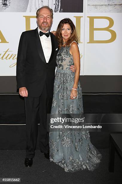 Arturo Artom and Alessandra Repini attend the amfAR Milano 2014 - Cocktail as part of Milan Fashion Week Womenswear Spring/Summer 2015 on September...