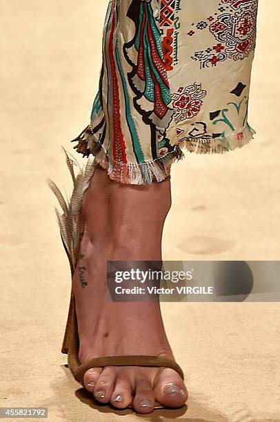 Model walks the runway during the Etro Ready to Wear show as a part of Milan Fashion Week Womenswear Spring/Summer 2015 on September 19, 2014 in...