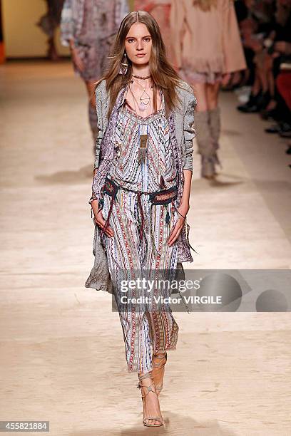 Model walks the runway during the Etro Ready to Wear show as a part of Milan Fashion Week Womenswear Spring/Summer 2015 on September 19, 2014 in...