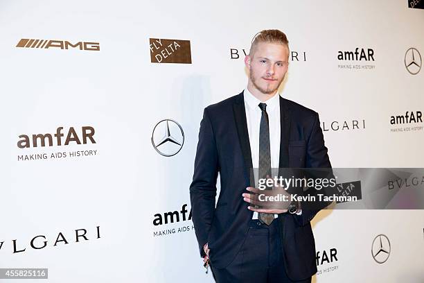 Alexander Ludwig attends amfAR Milano 2014 event during Milan Fashion Week Womenswear Spring/Summer 2015 on September 20, 2014 in Milan, Italy.