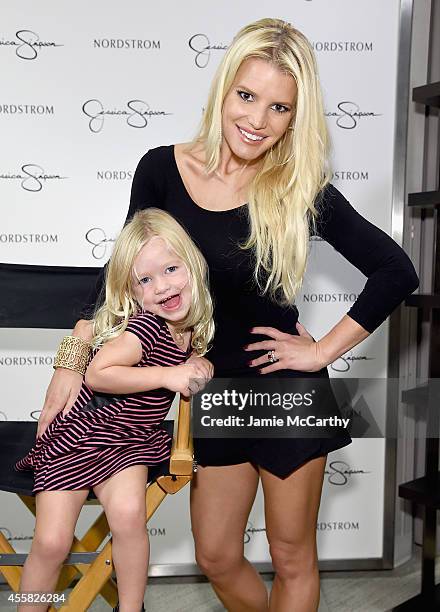 Jessica Simpson wearing Jessica Simpson Collection and Maxwell Drew Johnson wearing Jessica Simpson Girls attend Jessica Simpson Collection Fashion...