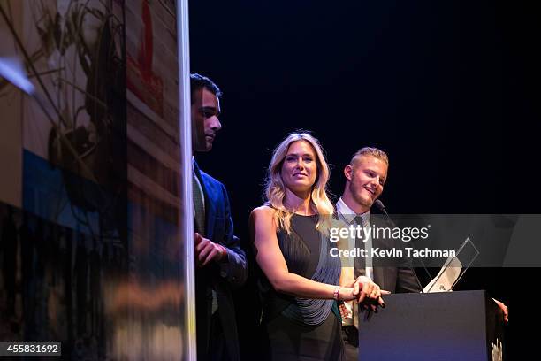 Bar Refaeli appears on stage during the amfAR Milano 2014 - Gala Dinner and Auction as part of Milan Fashion Week Womenswear Spring/Summer 2015 on...