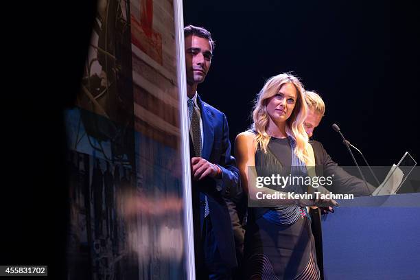 Bar Refaeli appears on stage during the amfAR Milano 2014 - Gala Dinner and Auction as part of Milan Fashion Week Womenswear Spring/Summer 2015 on...