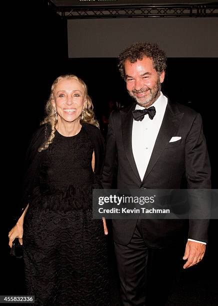 Franca Sozzani and Remo Ruffini attend the amfAR Milano 2014 - Gala Dinner and Auction as part of Milan Fashion Week Womenswear Spring/Summer 2015 on...