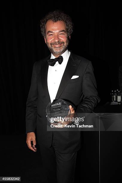 Remo Ruffini walks off stage during the amfAR Milano 2014 - Gala Dinner and Auction as part of Milan Fashion Week Womenswear Spring/Summer 2015 on...