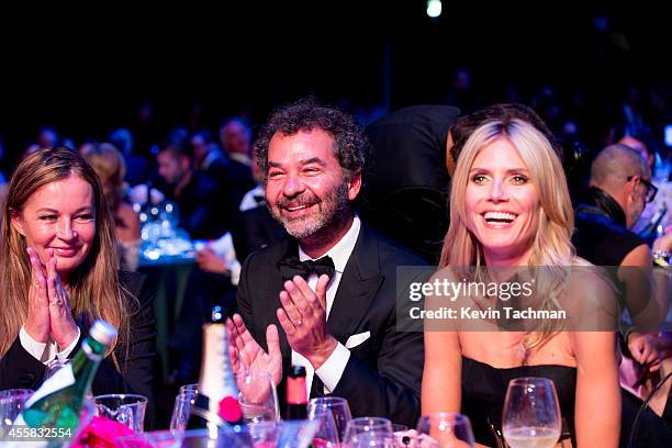 Eva Cavalli, Remo Ruffini and Heidi Klum attend the amfAR Milano 2014 - Gala Dinner and Auction as part of Milan Fashion Week Womenswear...