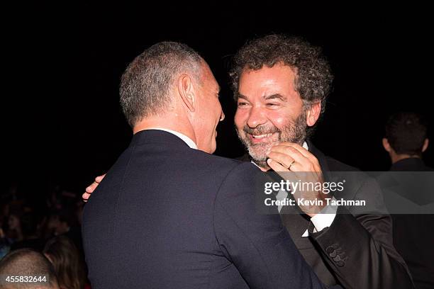 Remo Ruffini walks off stage during the amfAR Milano 2014 - Gala Dinner and Auction as part of Milan Fashion Week Womenswear Spring/Summer 2015 on...