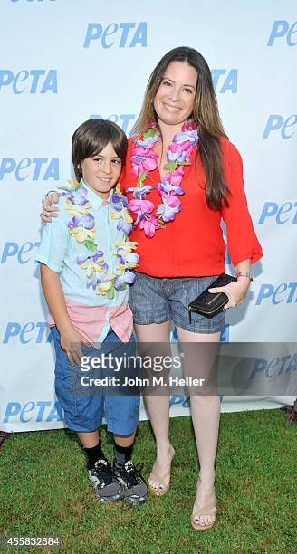 Finley Donoho and actress Holly Marie Combs attend PETA's Vegan Luau at Sam Simon's home on September 20, 2014 in Pacific Palisades, California.