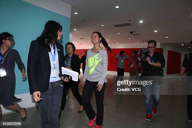 Tennis player Li Na attends a press conference to announce her retirement from playing tennis on September 21, 2014 in Beijing, China.