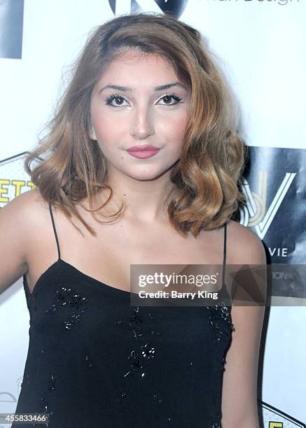 Actress Jennessa Rose attends the Friend Movement's 2014 Stardust Soiree at Madame Tussauds on September 20, 2014 in Hollywood, California.