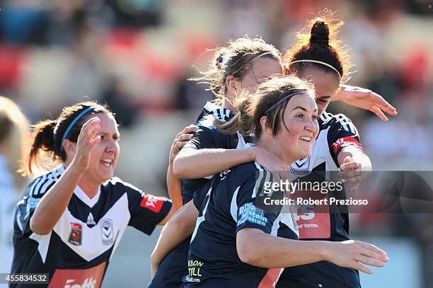 Racheal Quigley of the Victory celebrates with team-mates after Amy Jackson of the Victory scored a goal during the round two W-League match between...