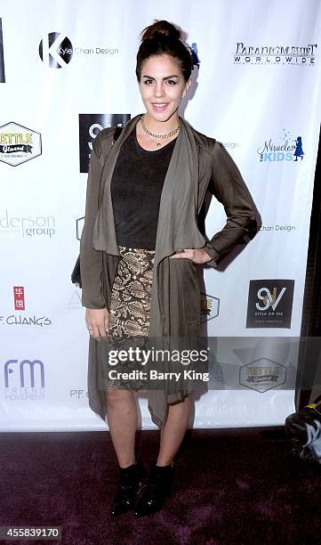 Personality Katie Maloney attends the Friend Movement's 2014 Stardust Soiree at Madame Tussauds on September 20, 2014 in Hollywood, California.