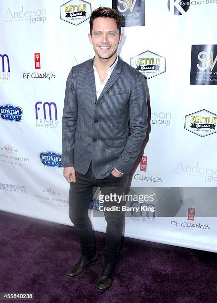 Singer Eli Lieb attends the Friend Movement's 2014 Stardust Soiree at Madame Tussauds on September 20, 2014 in Hollywood, California.